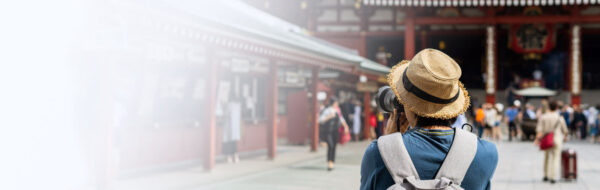 Traveler taking photo of a temple